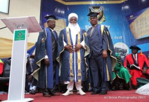 Top officers of UI management pose with new Chancellor, Abubakar III in November 2015, while the then outgoing Vice Chancellor and newly appointed Minister of Health Prof. Isaac Folorunso Adewole watched with keen interest.